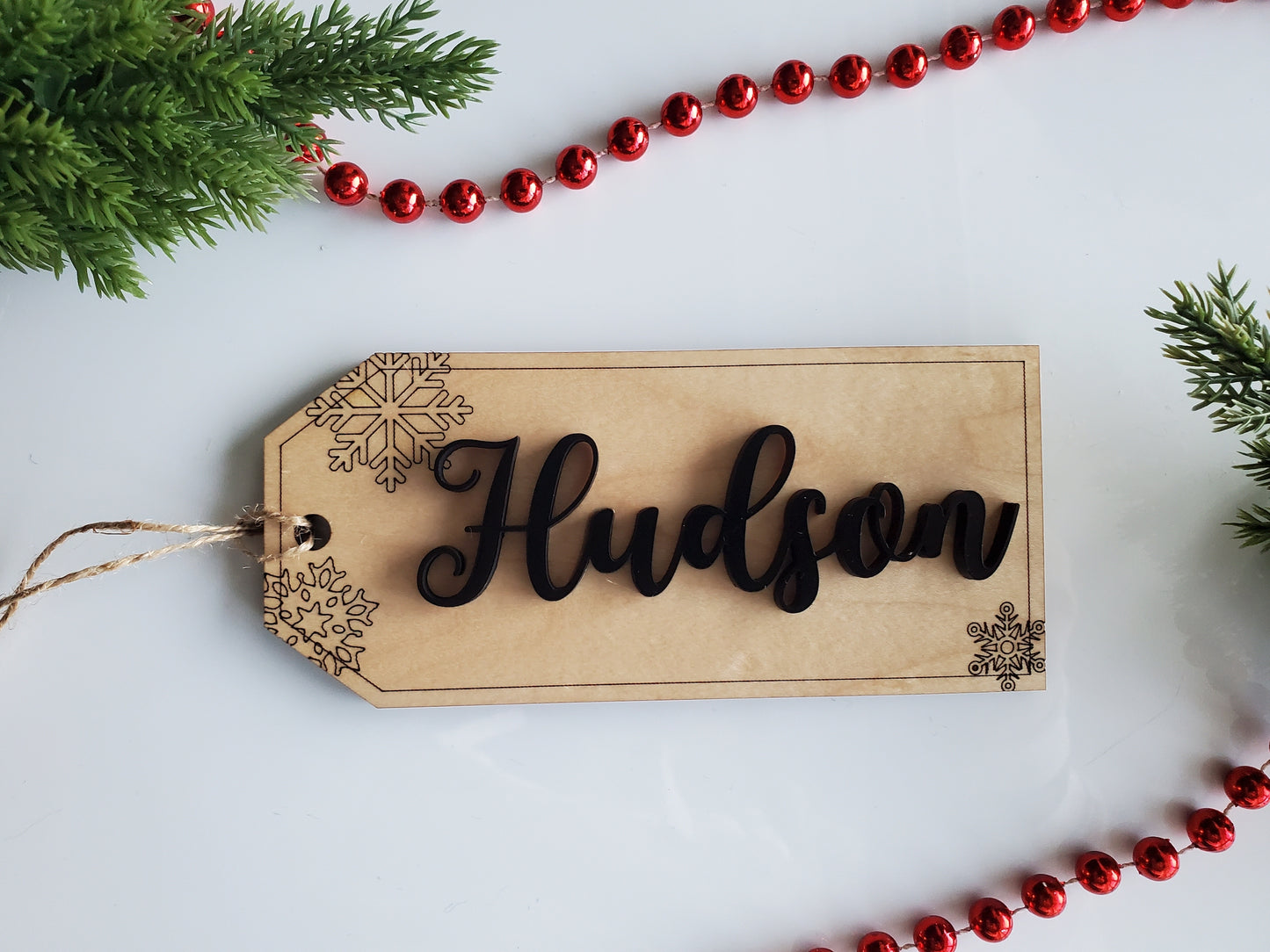 Stocking tag with engraved Snowflakes